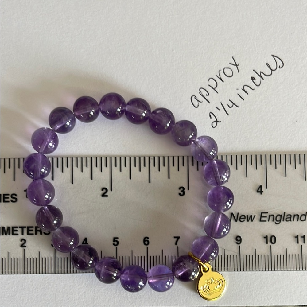 Purple Beaded Bracelet with Gold tones Charm
